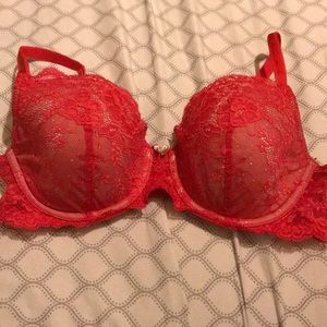 A red lightly lined Victoria secret bra size 34D